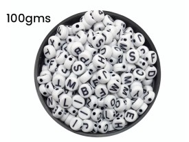 Cuentas plasticas pastilla blanca letra negra